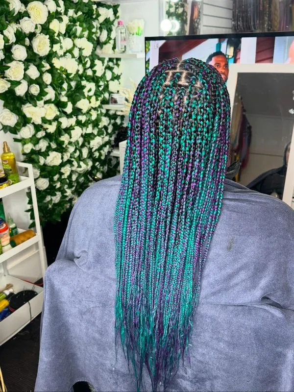 Medium box braids — salon work by Mariama
