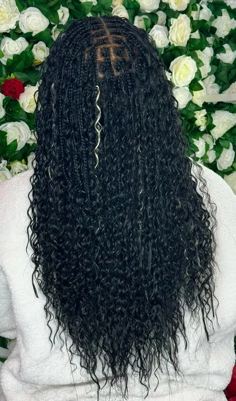 Knotless boho braids ( synthetic curls ) — salon work by Mariama